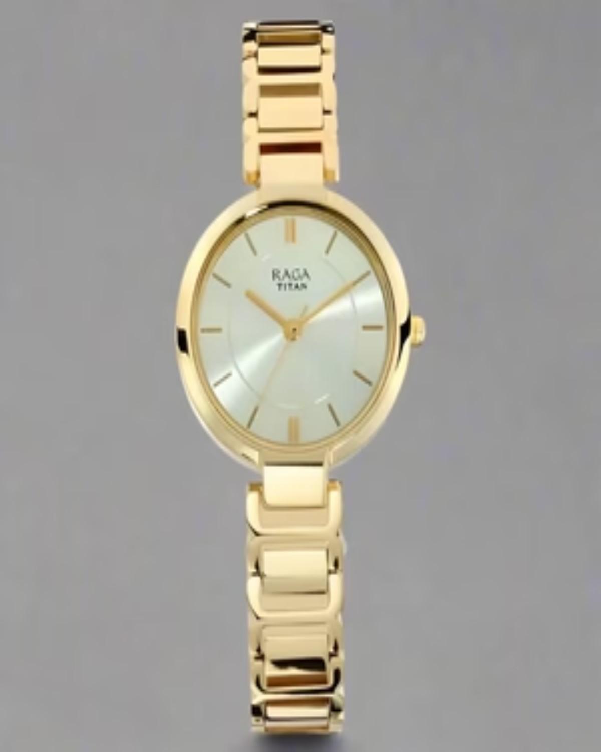 TITAN RAGA VIVA QUARTZ ANALOG CHAMPAGNE DIAL GOLD-TONE METAL STRAP WOMEN’S WATCH NT2608YM01